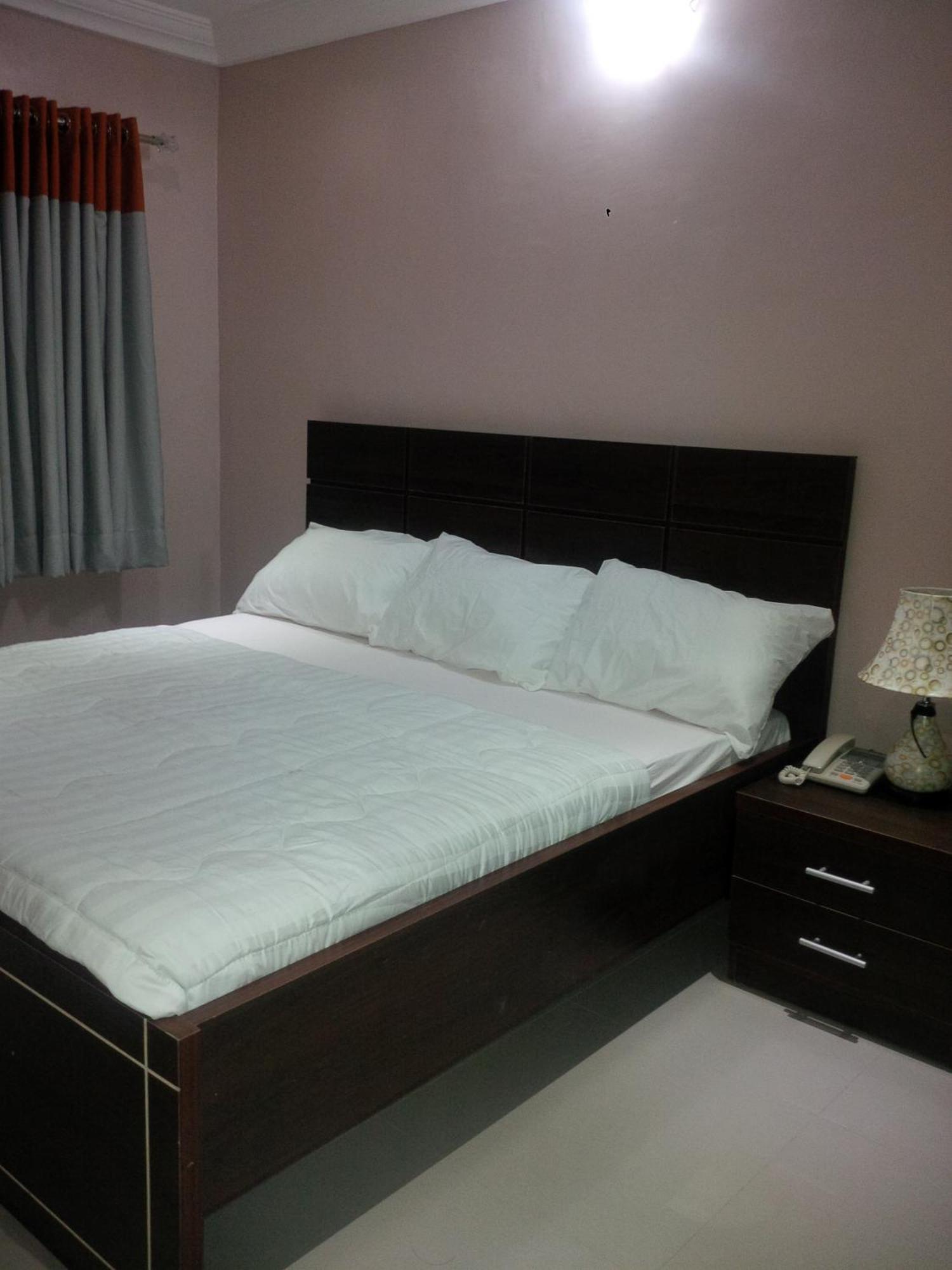 Haute Aparthotel Ikeja Habitación foto