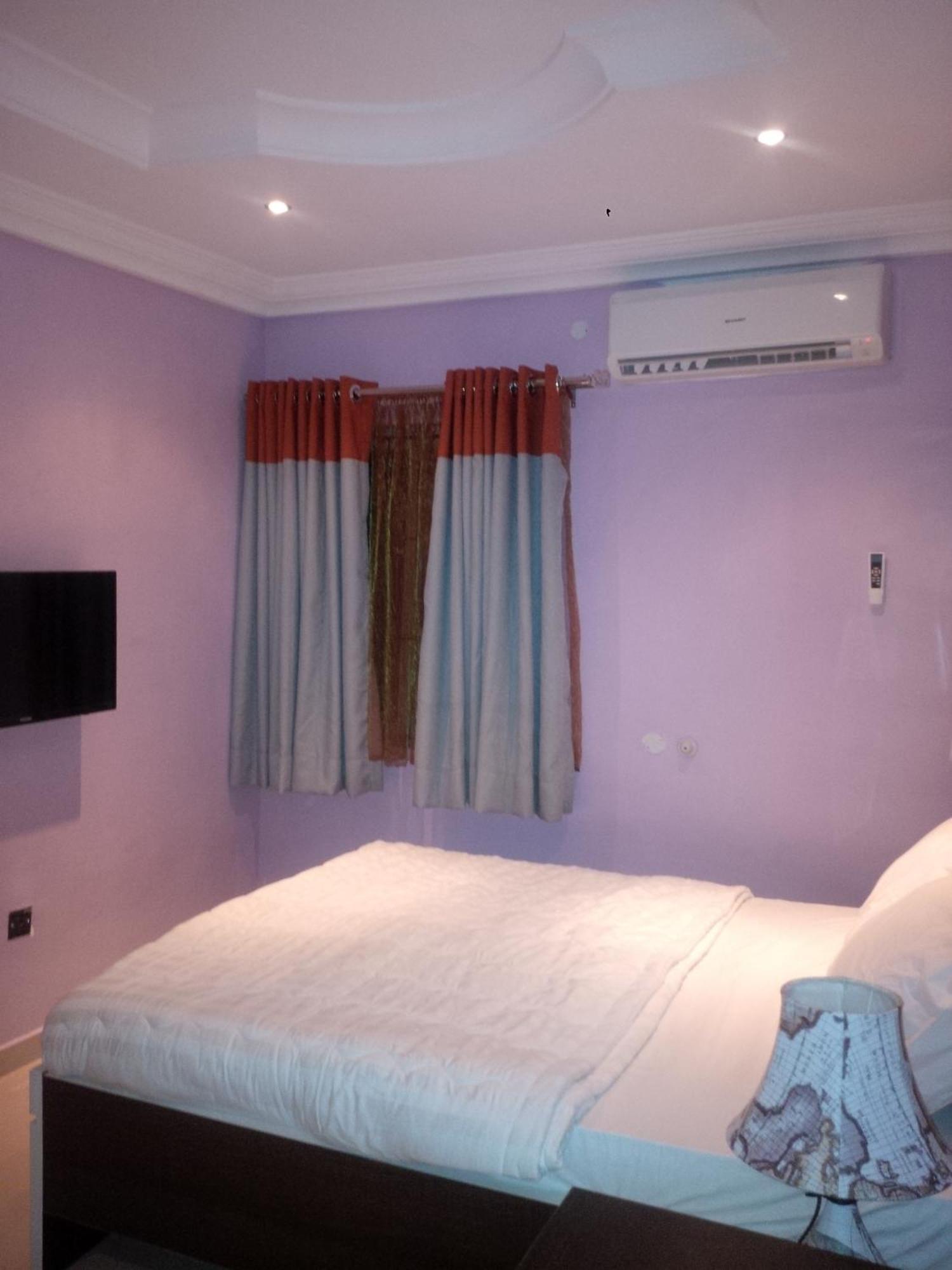 Haute Aparthotel Ikeja Habitación foto