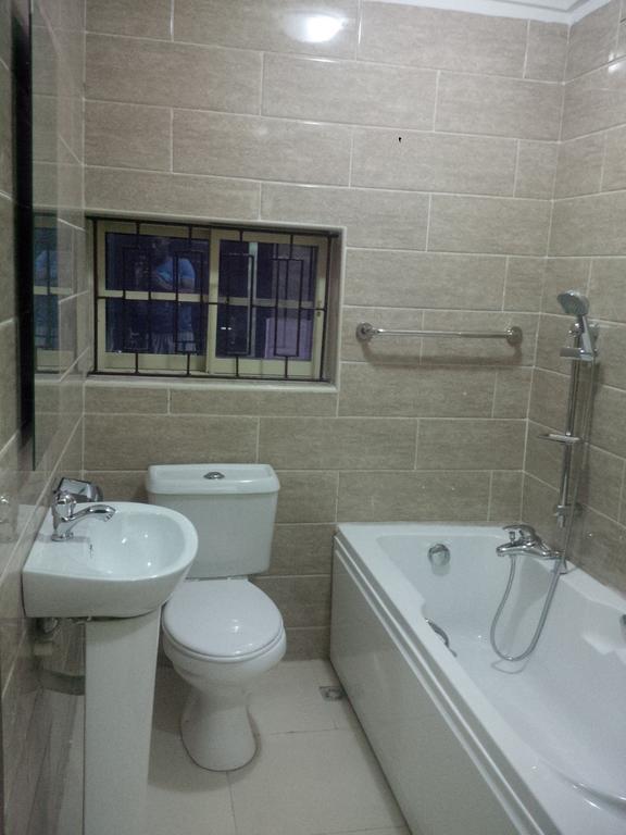 Haute Aparthotel Ikeja Habitación foto